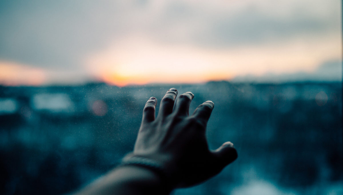 Hand reaching to the Horizon