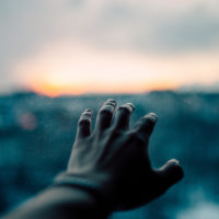 Hand reaching to the Horizon
